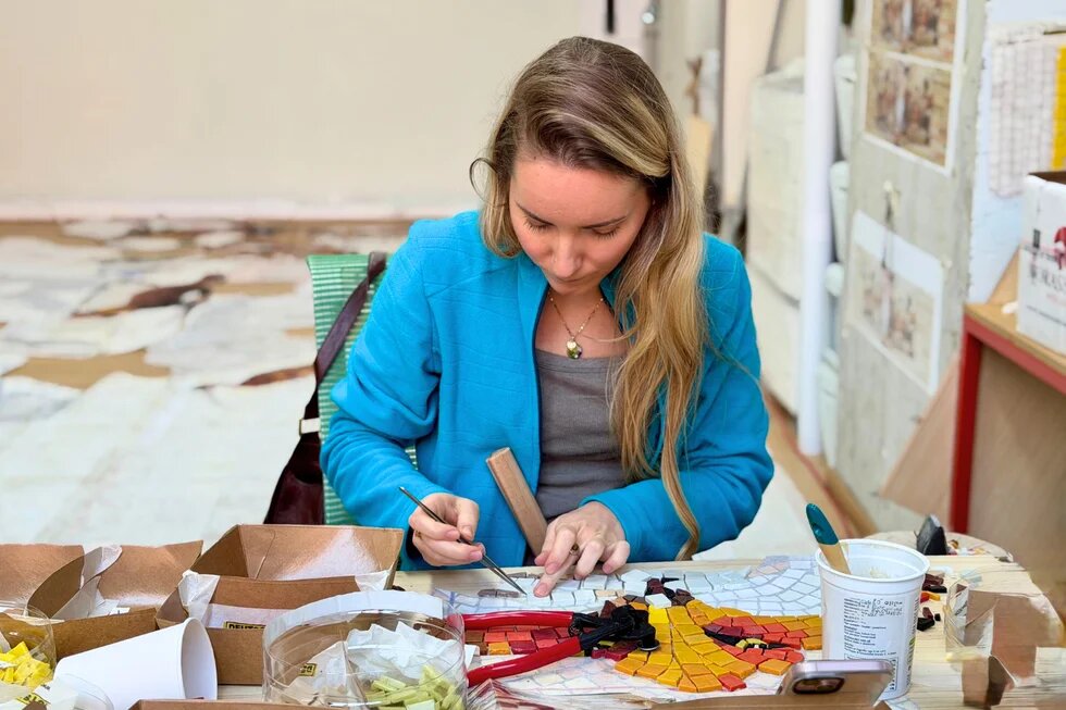 Mosaic artist, Marta working 